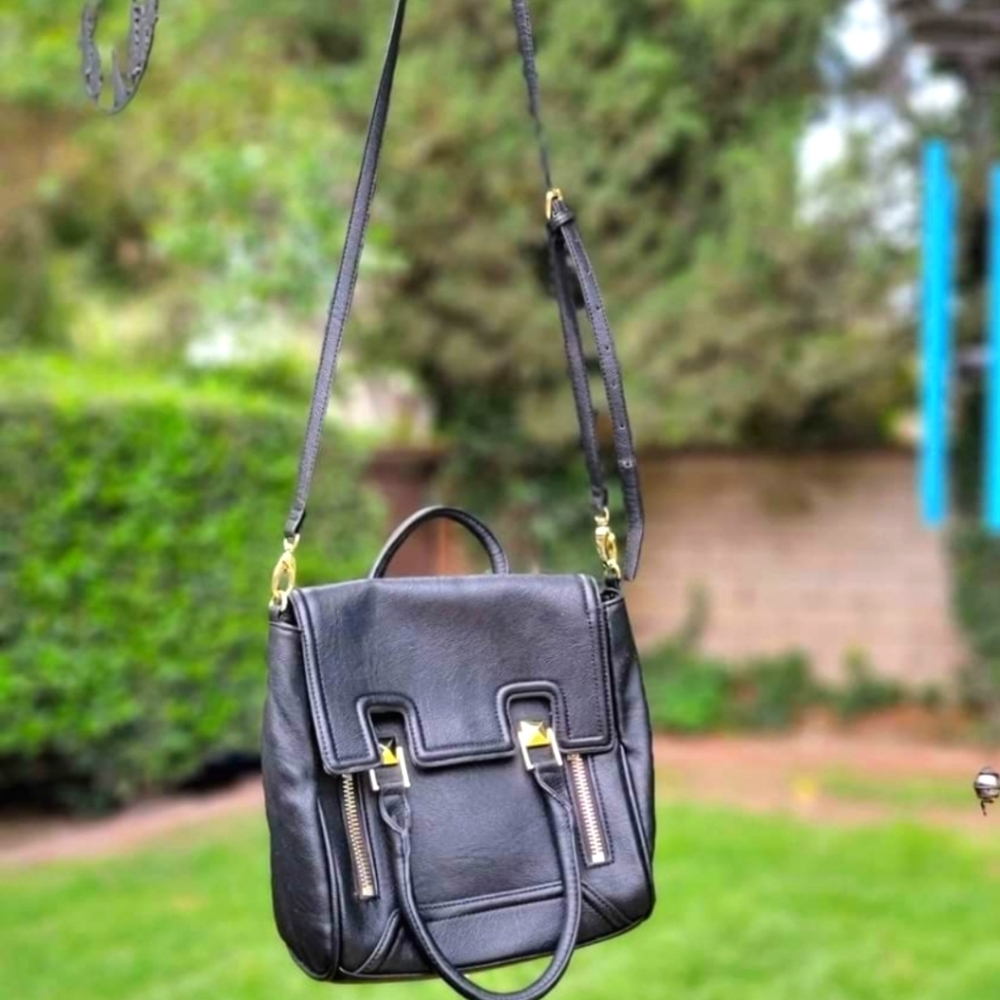 Olivia + Joy black‎ bag.  Versatile (hand, shoulder,  crossbody or backpack).